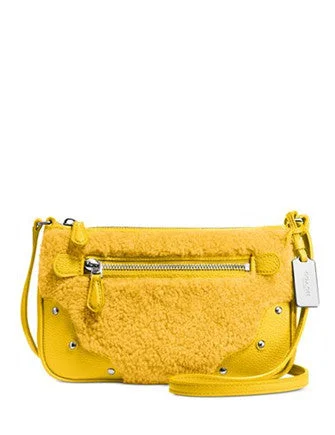 Coach Small Rhyder Pochette in Shearling